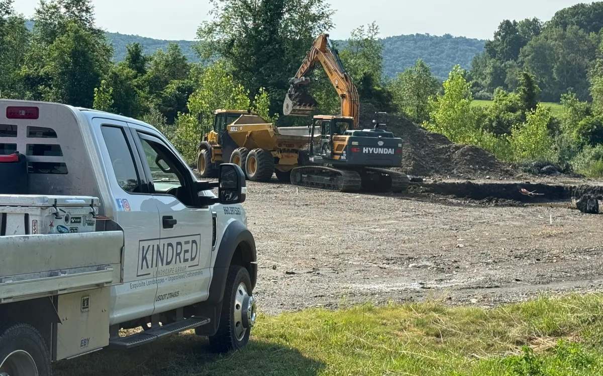 Excavation equipment and Kindred truck at an active site work project.